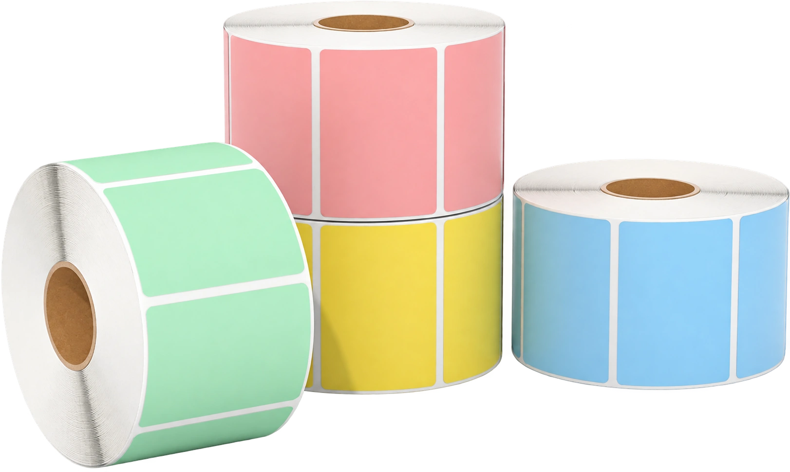 Rollos de etiquetas fondeadas en verde, rosa, amarillo y azul, sin impresión
